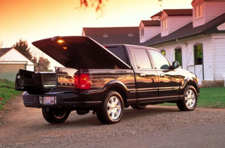 Illustration for article titled The Lincoln Blackwood Was A Big Black Coach-built F-150